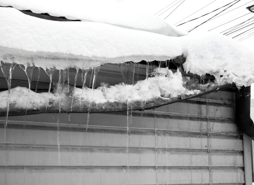 Ice dam along a roof edge
